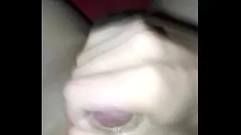 a woman licking her own pussy